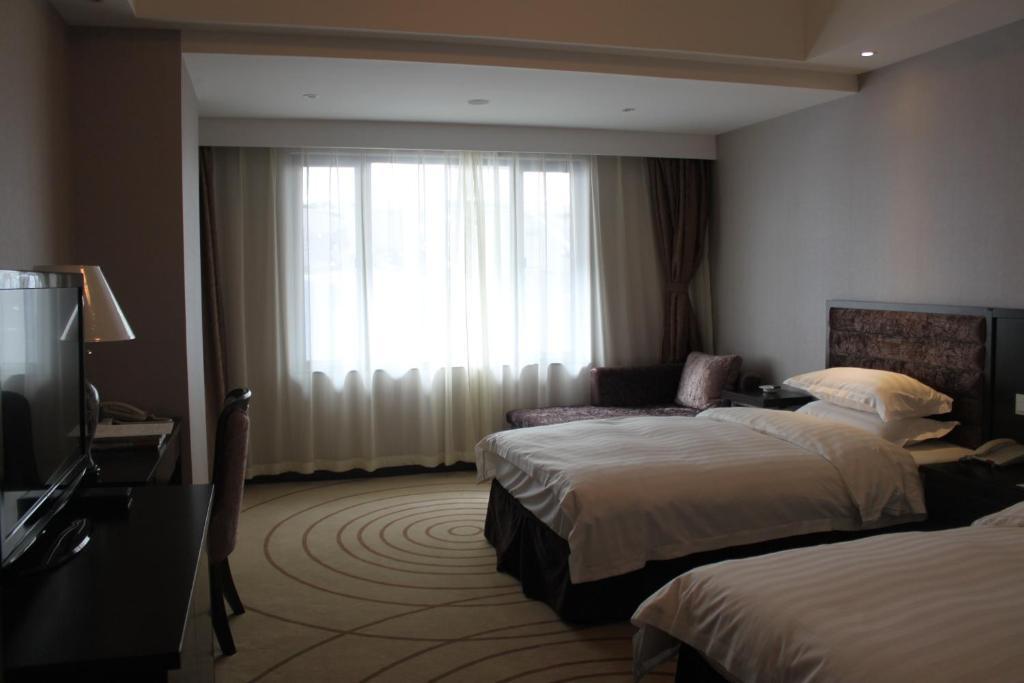Grand Trustel Mandarin Garden Otel Nankin Oda fotoğraf